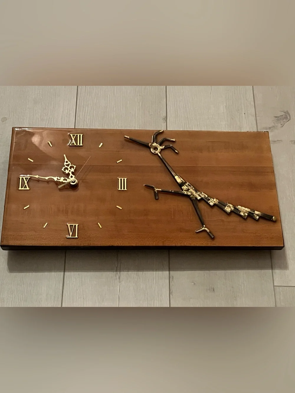 Brown Wood Wall Clock with Gold Metal toad runner